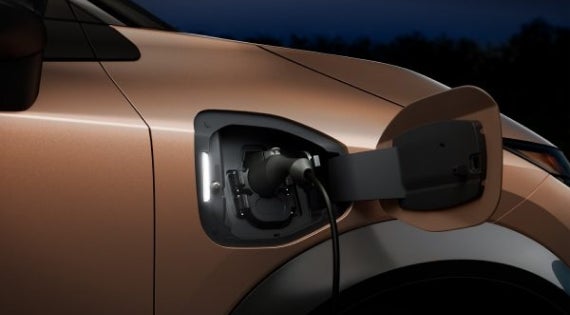 Close-up image of charging cable plugged in | Nissan of Pittsfield in Pittsfield MA
